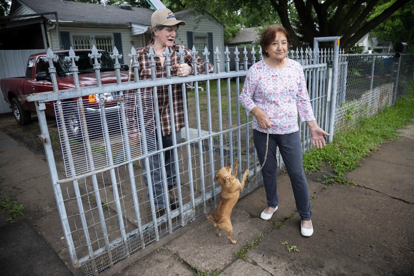 From left, Pleasant Grove residents Agustin Cano, 84, and wife Cruz Cano, 79, and their dog...