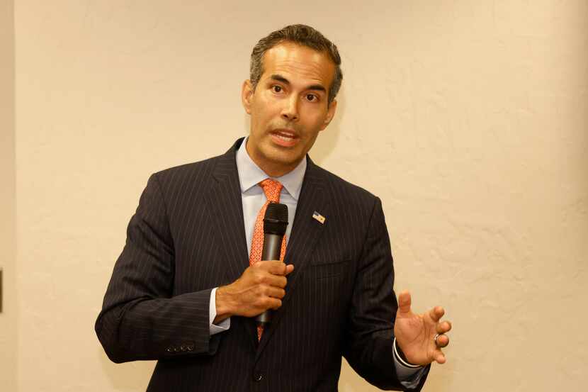 George P. Bush, who is in a runoff with Attorney General Ken Paxton, speaks at a Texans...