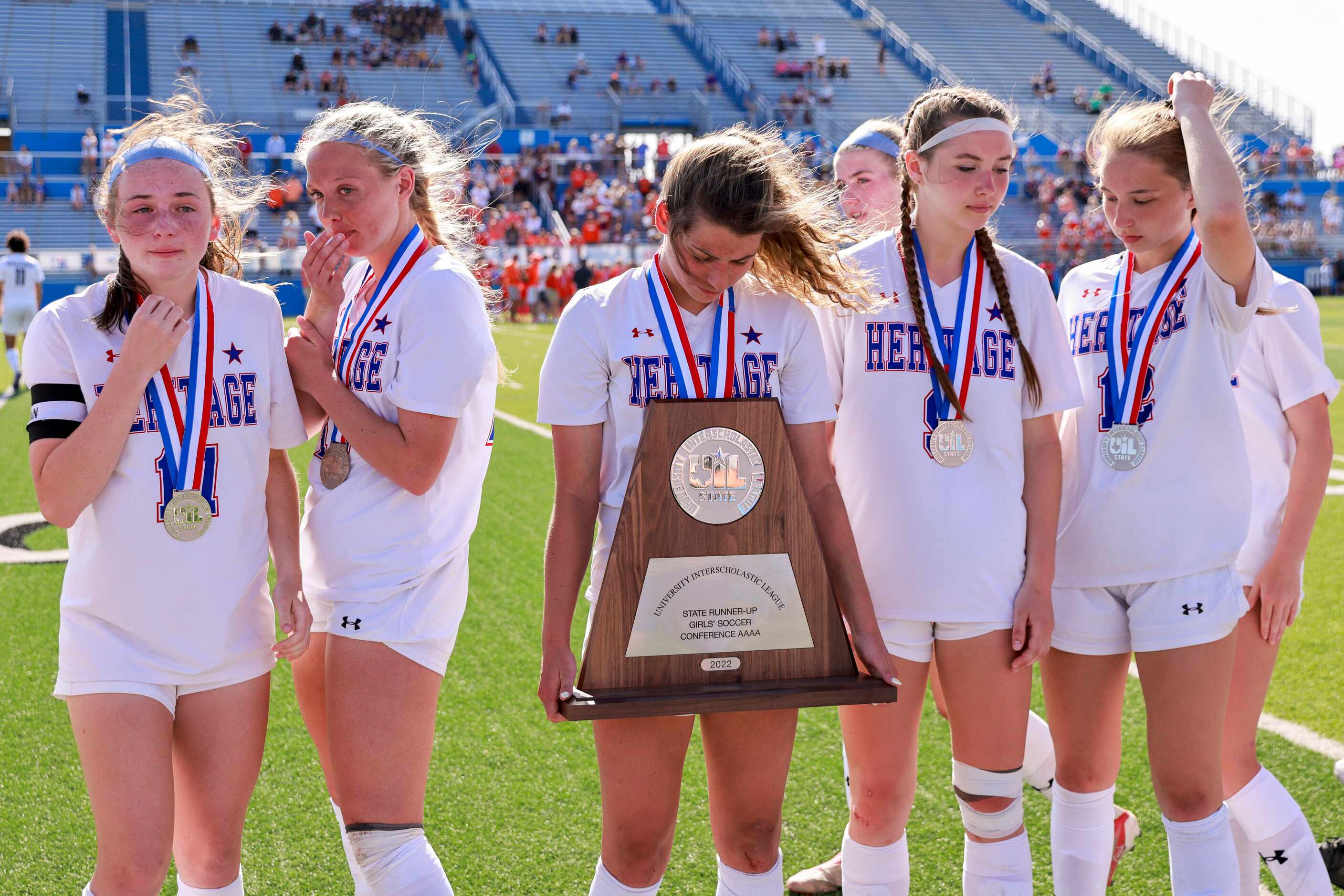 Midlothian Heritage midfielder Jules Burrows (3) holds the the Class 4A girls soccer state...