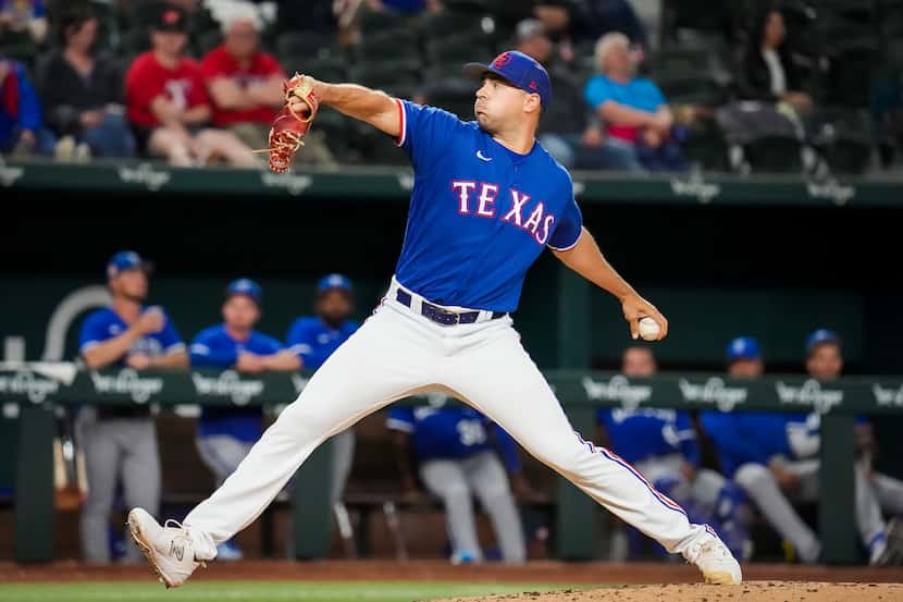 Texas Rangers relief pitcher Brock Burke delivers during the seventh inning of an exhibition...