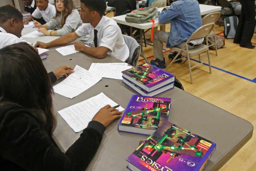 Students work in class during the school day at Focus Learning Academy charter school,...