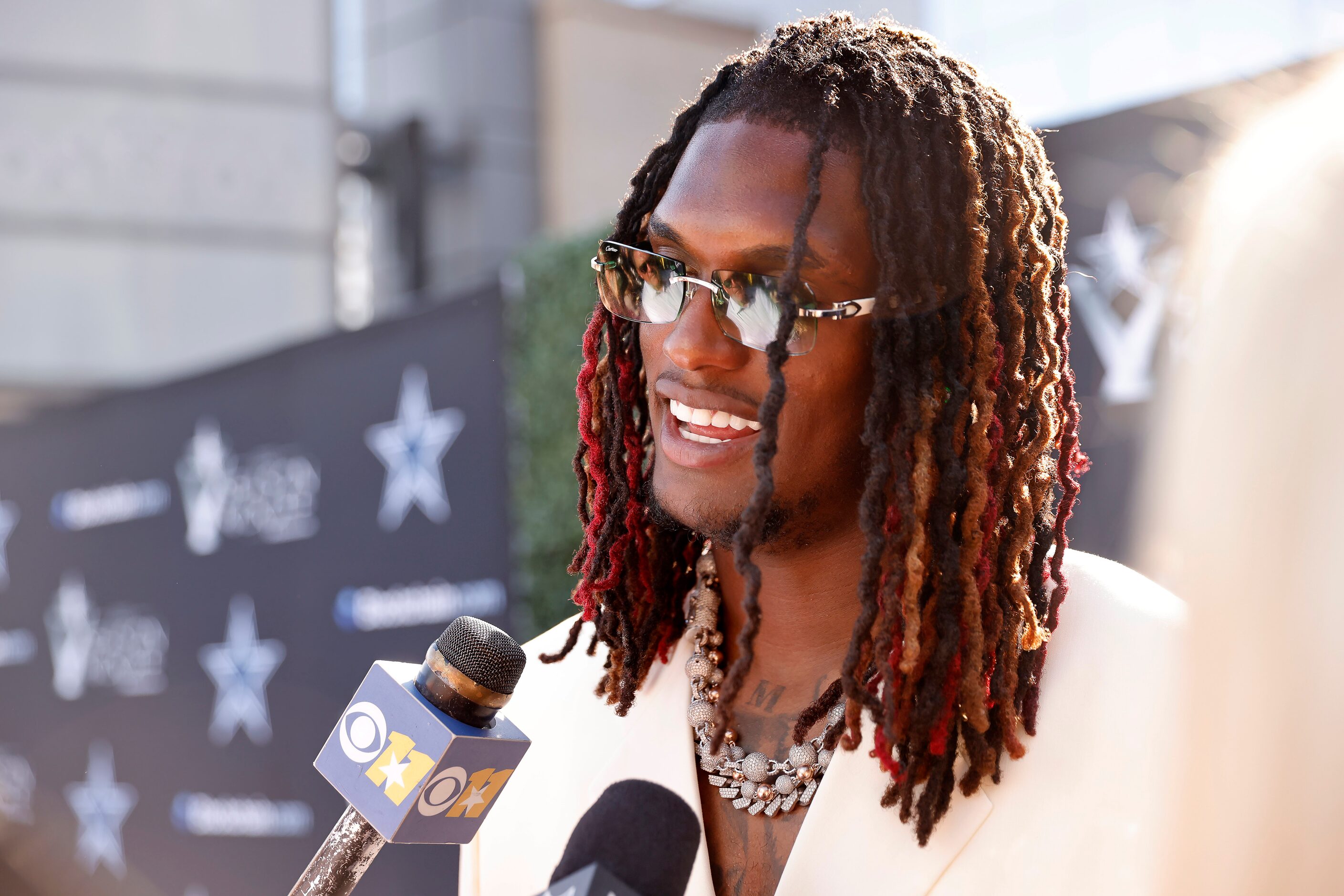 Dallas Cowboys wide receiver CeeDee Lamb arrives on the blue carpet and answers questions...