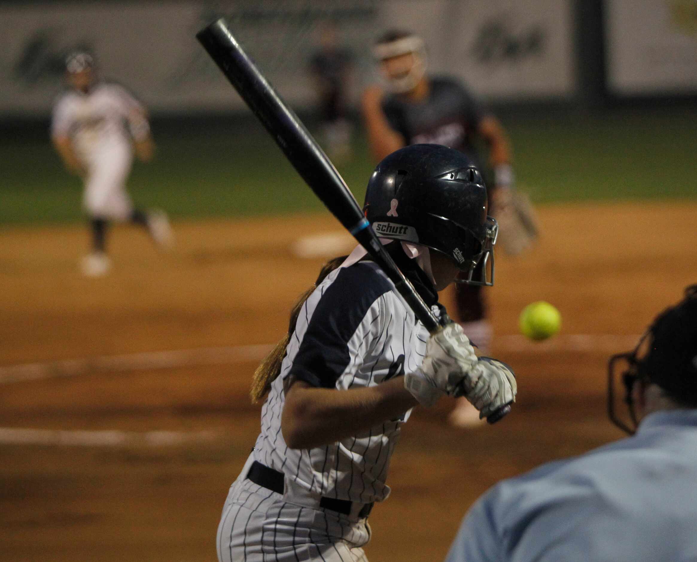 Flower Mound infielder Jori Whinery (10) eyes a pitch as she bats during the bottom of the...