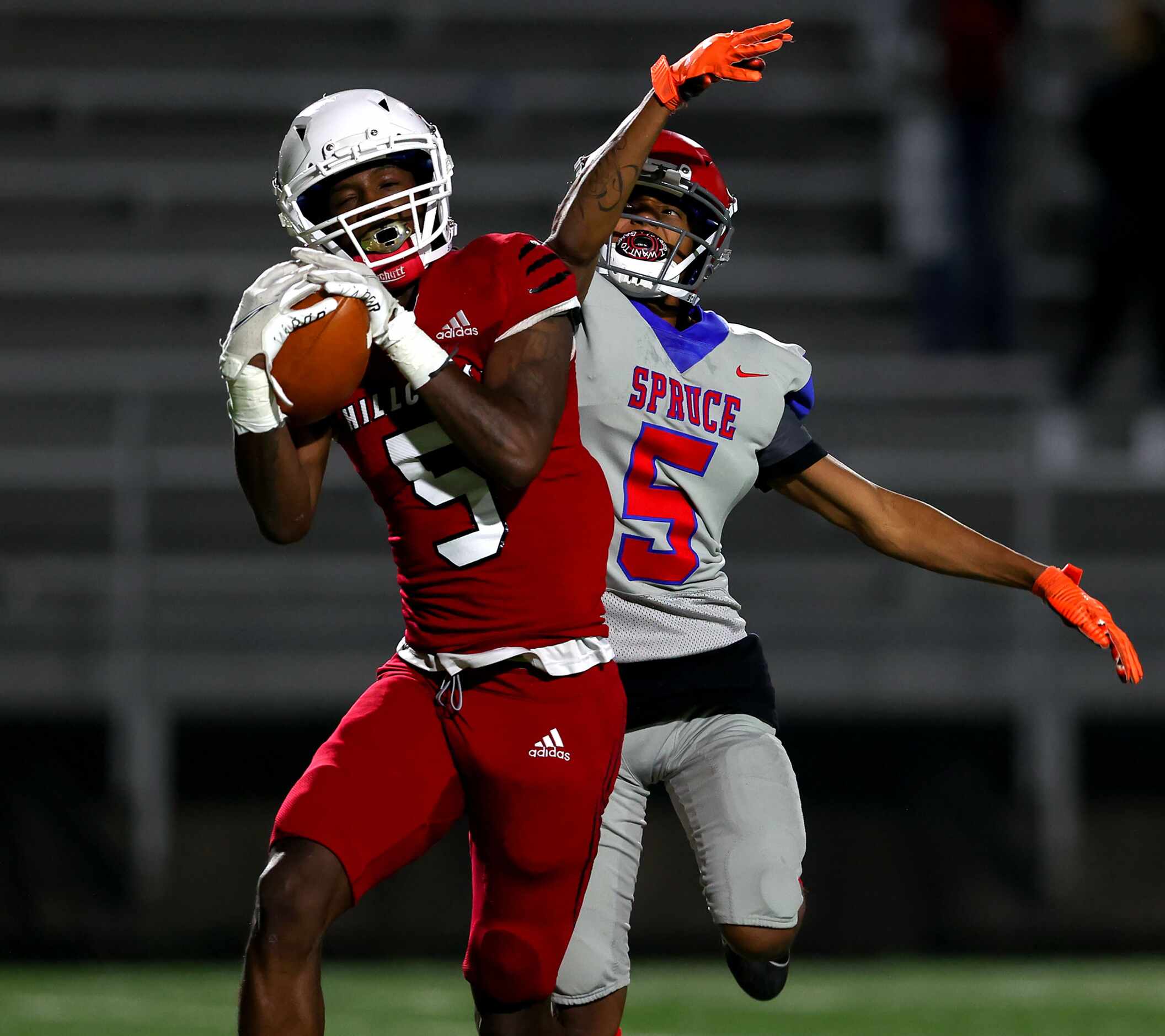 Hillcrest wide receiver Shannon Cruse (5) hauls in a 30 yard touchdown reception against...