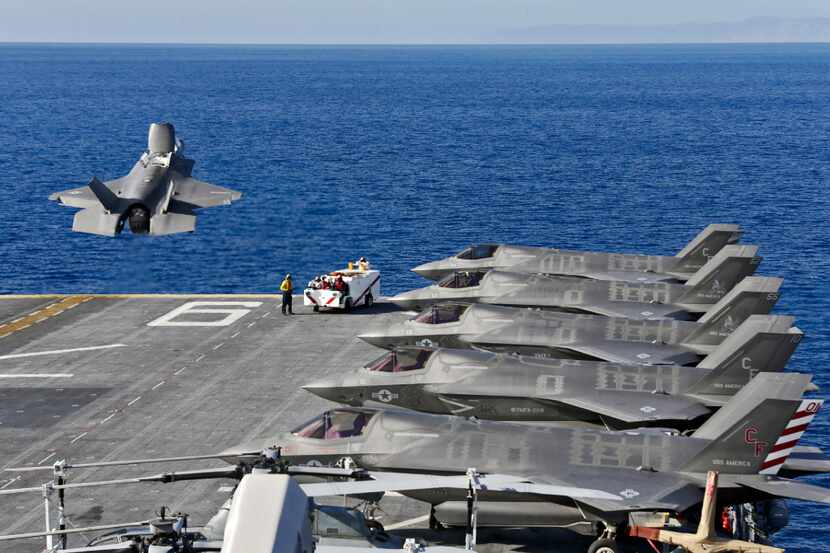 The Lockheed Martin F-35B Lightning II supersonic aircraft takes off from amphibious assault...