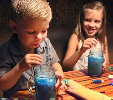 Eli and Madi Brantley of Sulpher Springs enjoy a taste of the special drink called "Bubbly...