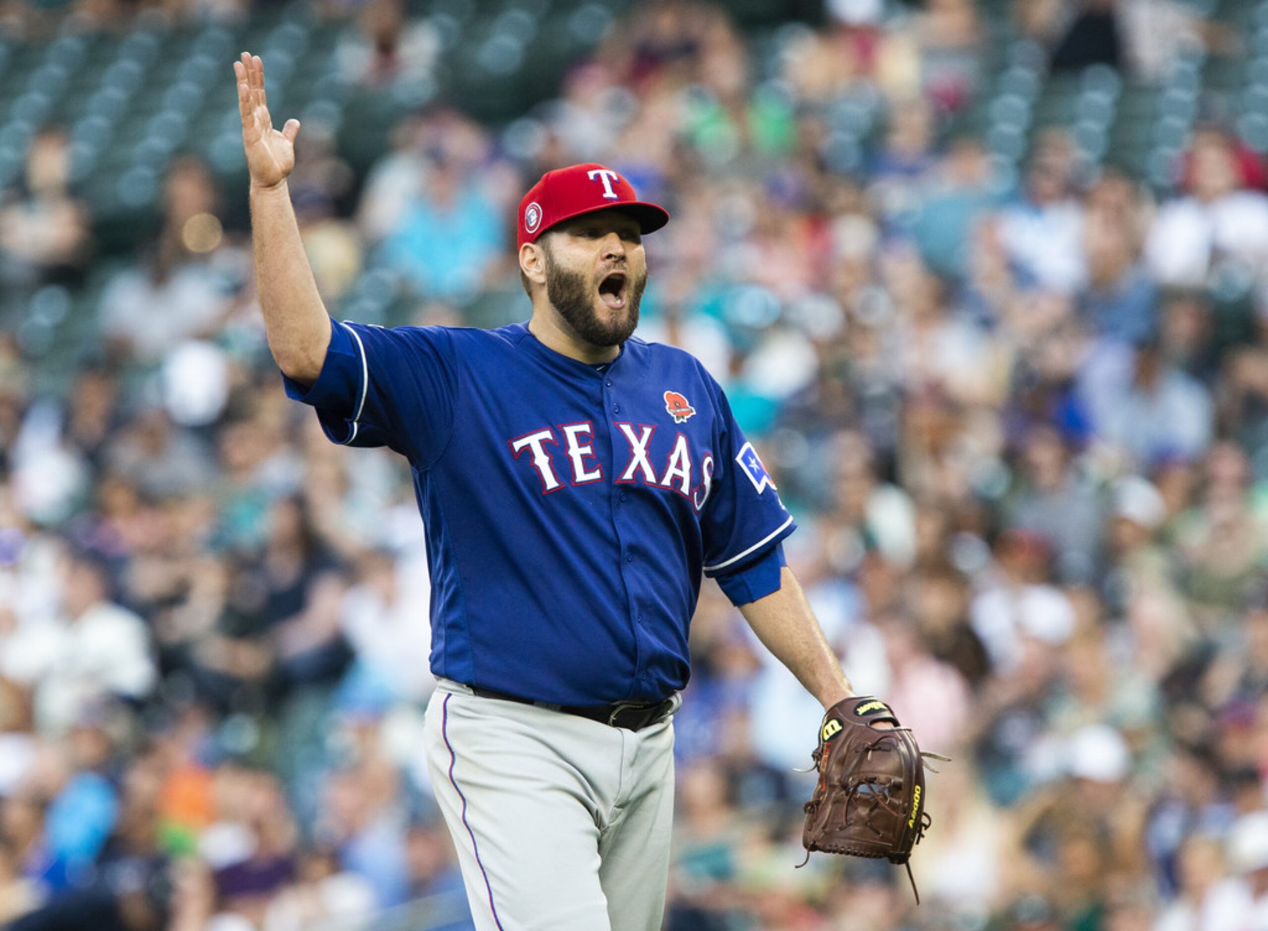 SEATTLE, WA - MAY 27:  Lance Lynn #35 of the Texas Rangers yells after the fifth inning...