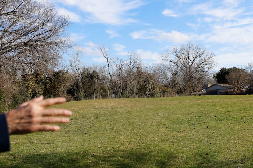 Garrett Boone gestures as he talks about ideas residents have suggested for some of the open...