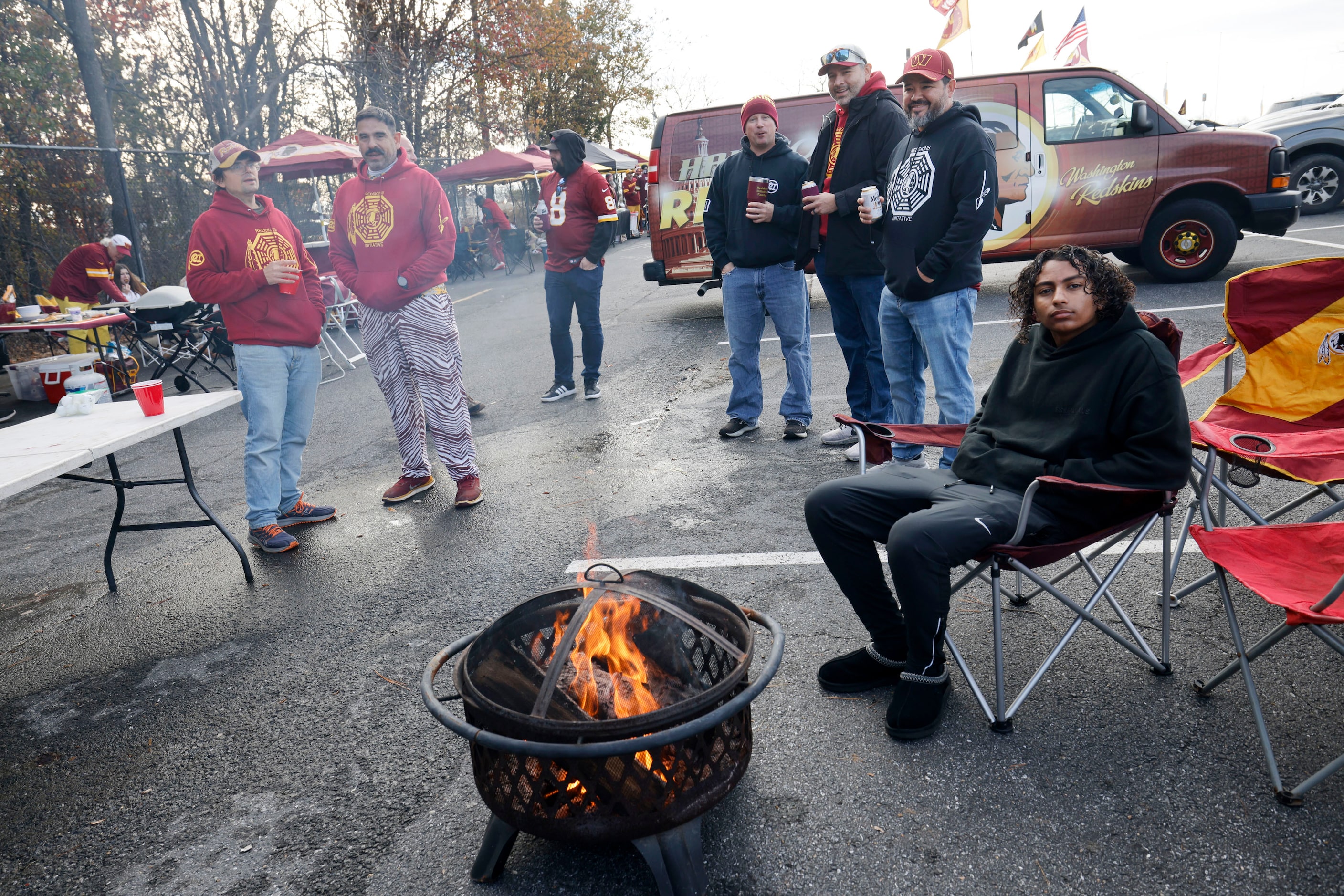 Fans spend time tailgating before an NFL football game between the Dallas Cowboys and the...