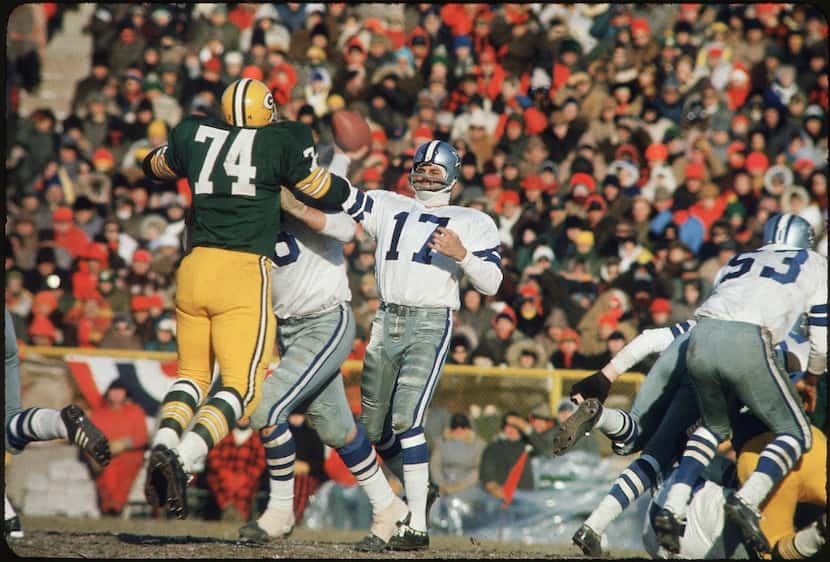 Don Meredith throwing a pass against the Green Bay Packers in the famous Ice Bowl game,...