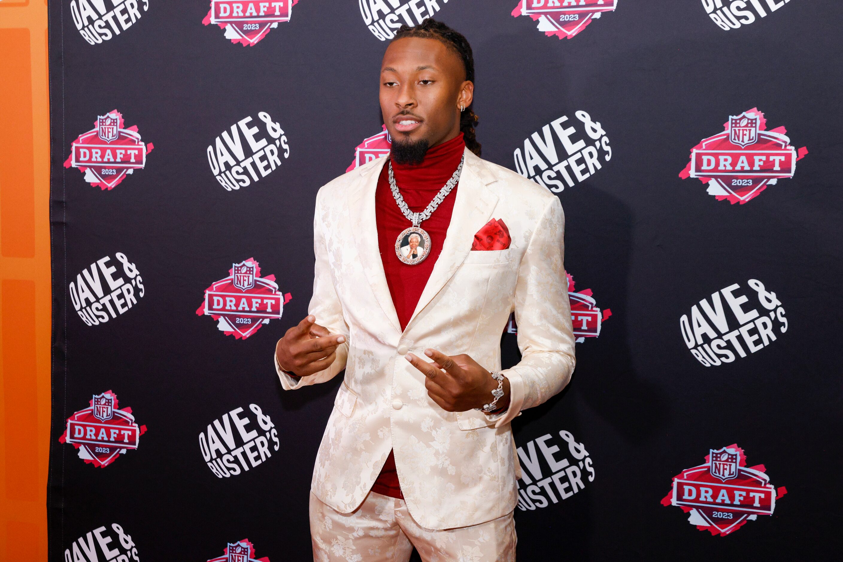 TCU wide receiver Quentin Johnston poses for photos on the red carpet before a 2023 NFL...