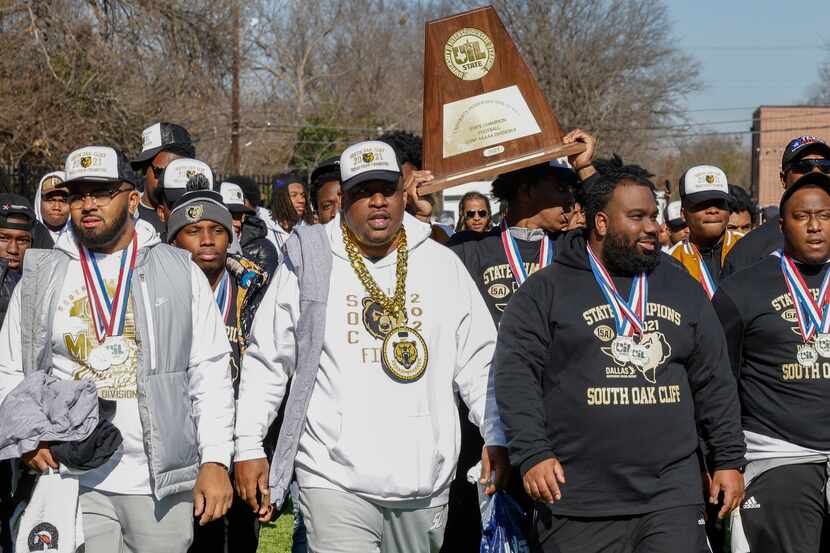 South Oak Cliff head coach Jason Todd leads the South Oak Cliff team to the stage before a...