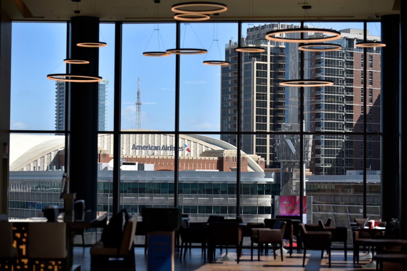 A view of the American Airlines Center seen inside the Cinepolis theater's main hall and bar...