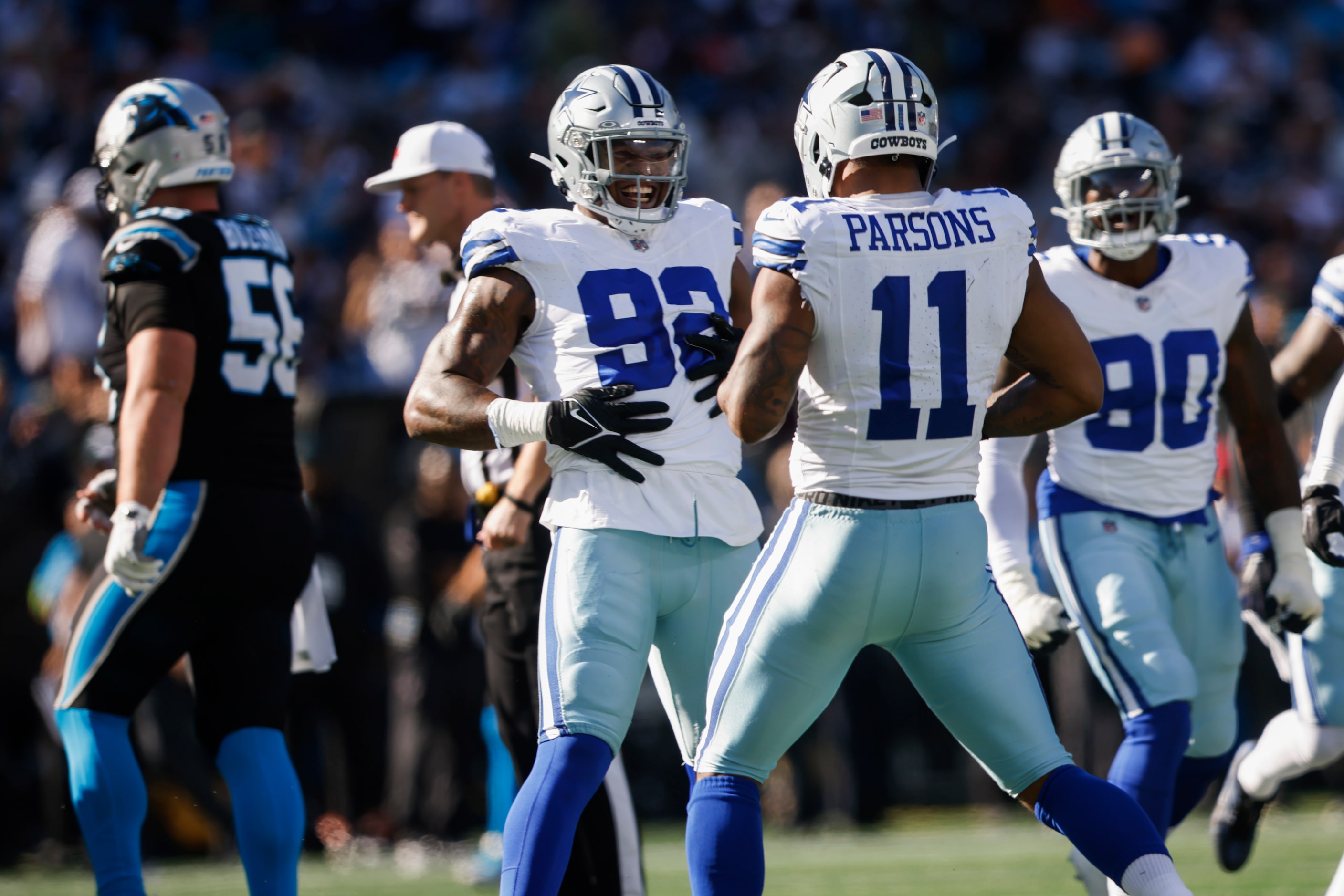 Dallas Cowboys defensive end Dorance Armstrong (92) and Dallas Cowboys linebacker Micah...