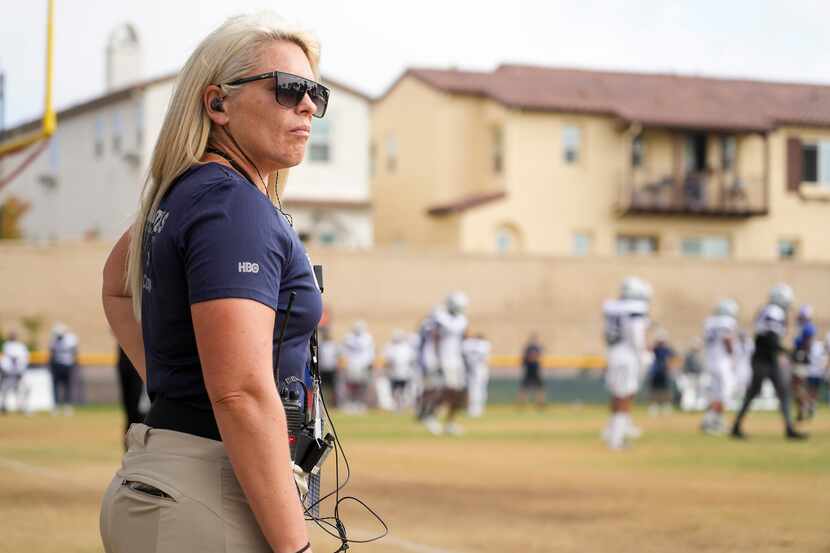 Shannon Furman of HBO’s Hard Knocks watches during a joint practice between the Dallas...