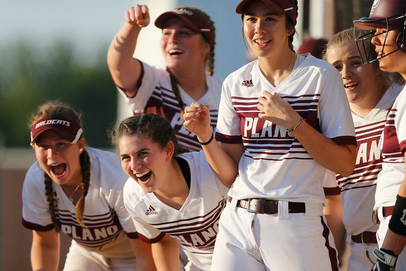 The Plano dugout gets fired up early in the first inning as Plano hosted Plano East earlier...