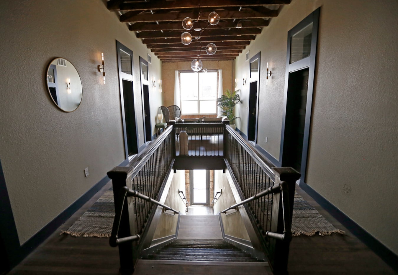 The stairs shot from the second floor at Deep Ellum Hostel in Dallas, Thursday, July 12,...