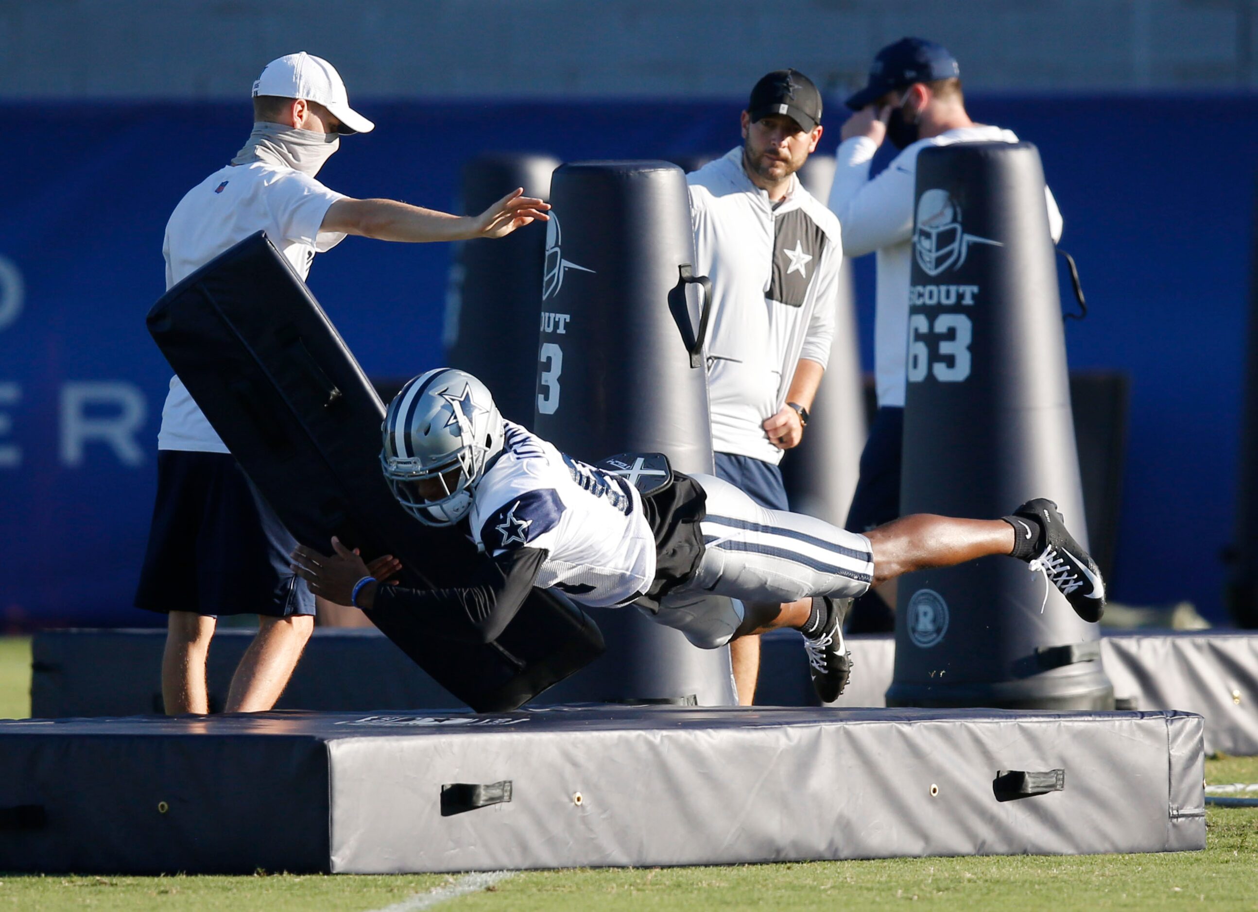 Dallas Cowboys wide receiver Jon'Vea Johnson (81) dives to make the tackle in a drill during...