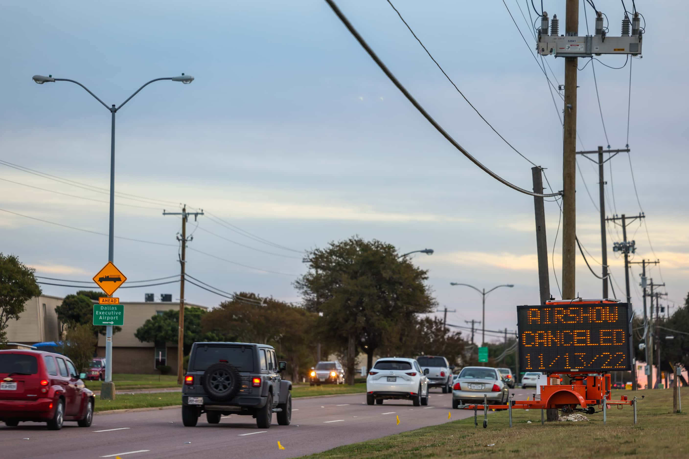 A sign outside of the entrance to the Dallas Executive Airport along Hampton Road flashes...