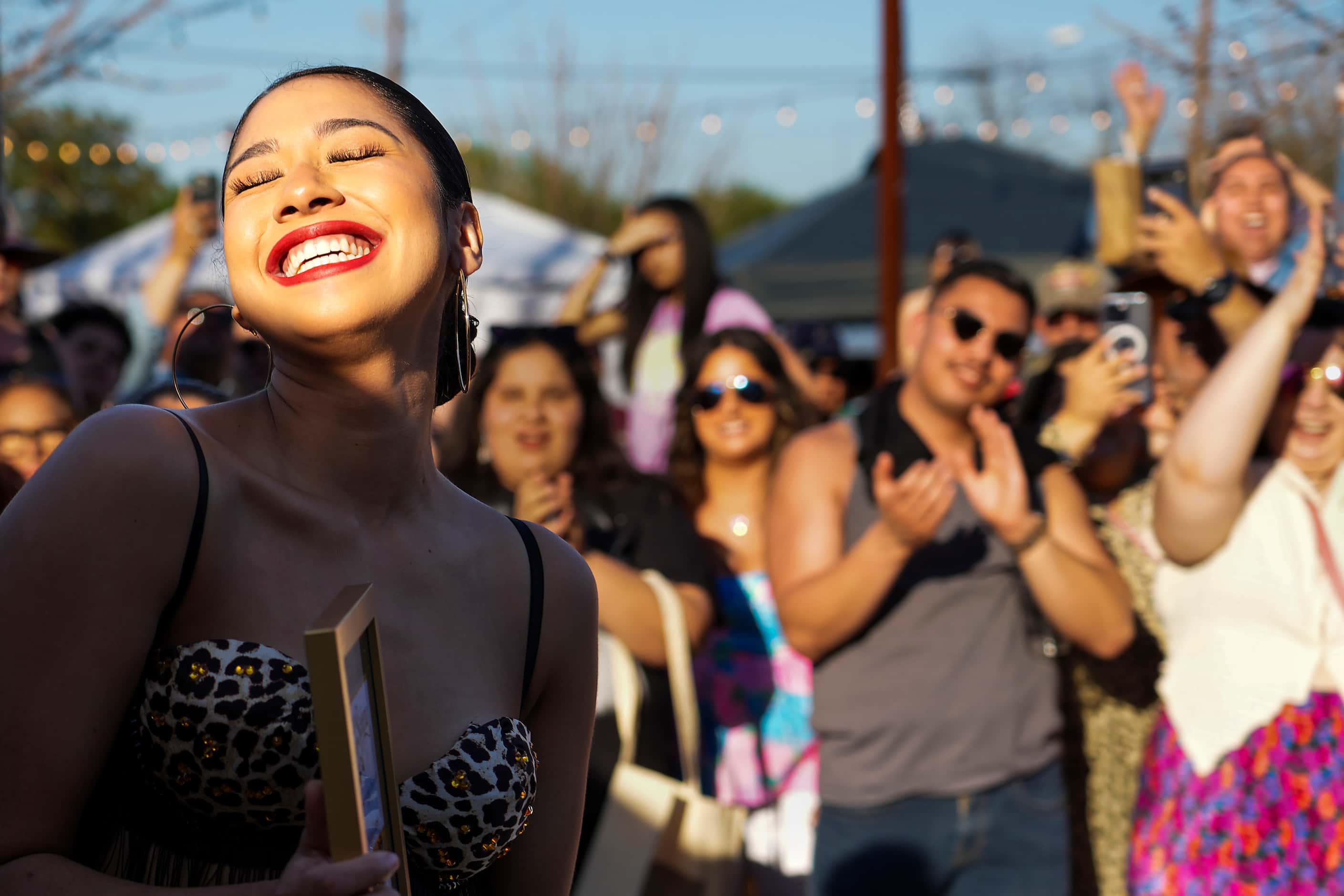 Olly Cruz reacts after she was named the winner in a Selena Quintanilla-Pérez look-alike...