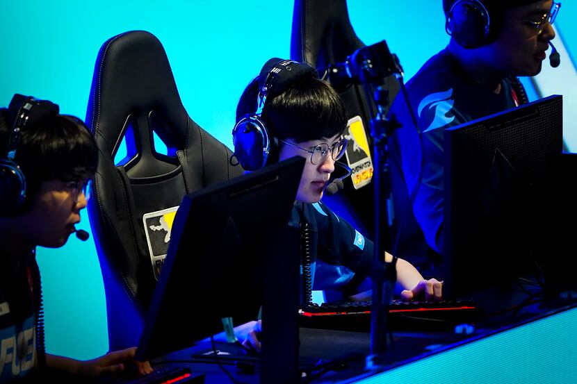 Jang "Decay" Gui-un of the Dallas Fuel (center) compete during a Overwatch League match...
