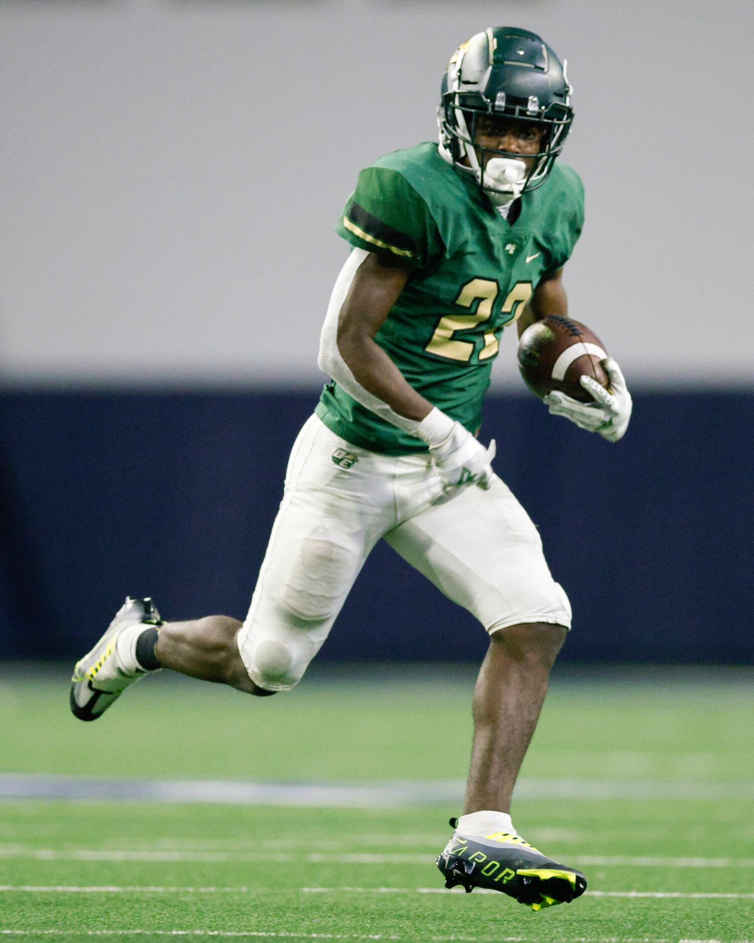 DeSoto’s Deondrae Ride Jr. (22) runs the ball during the first half of a Class 6A Division...