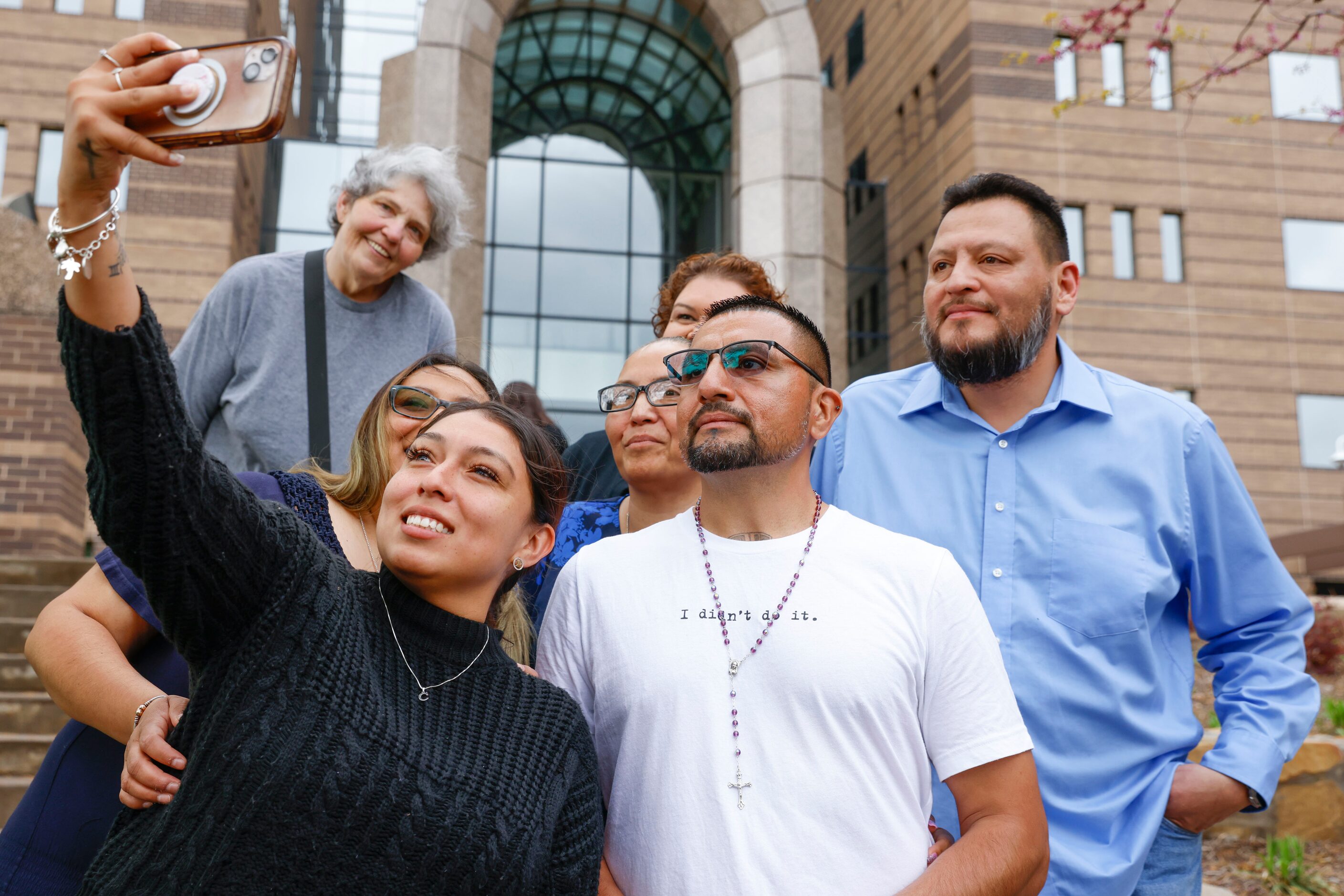 Chayra Perales takes selfie with her brothers Martin Santillan (center), and Pedro Martinez...