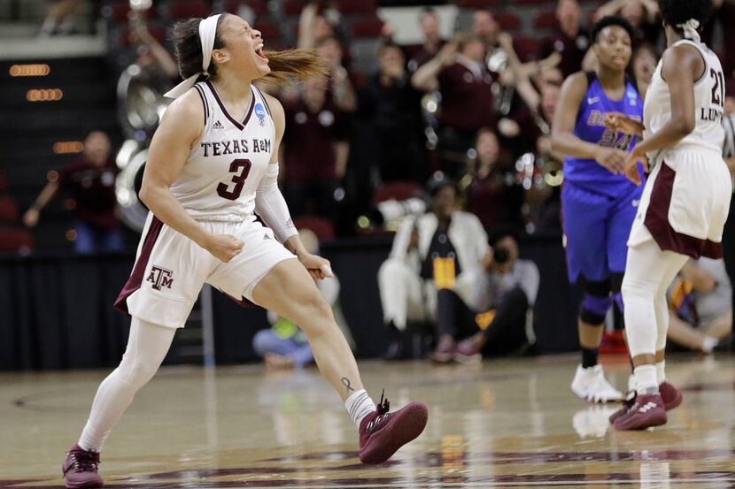 Texas A&M's Chennedy Carter (3) reacts after making the winning basket against DePaul during...