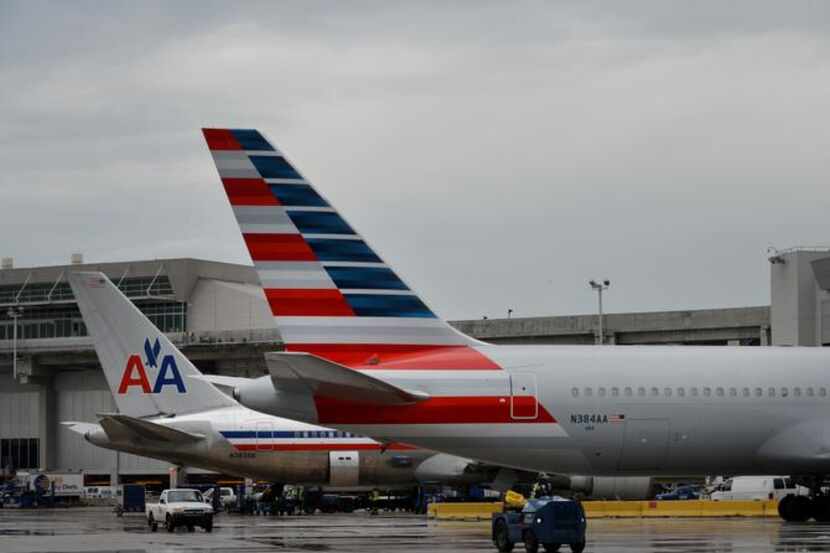 
The joint contract covers flight attendants of US Airways and American, which merged Dec....