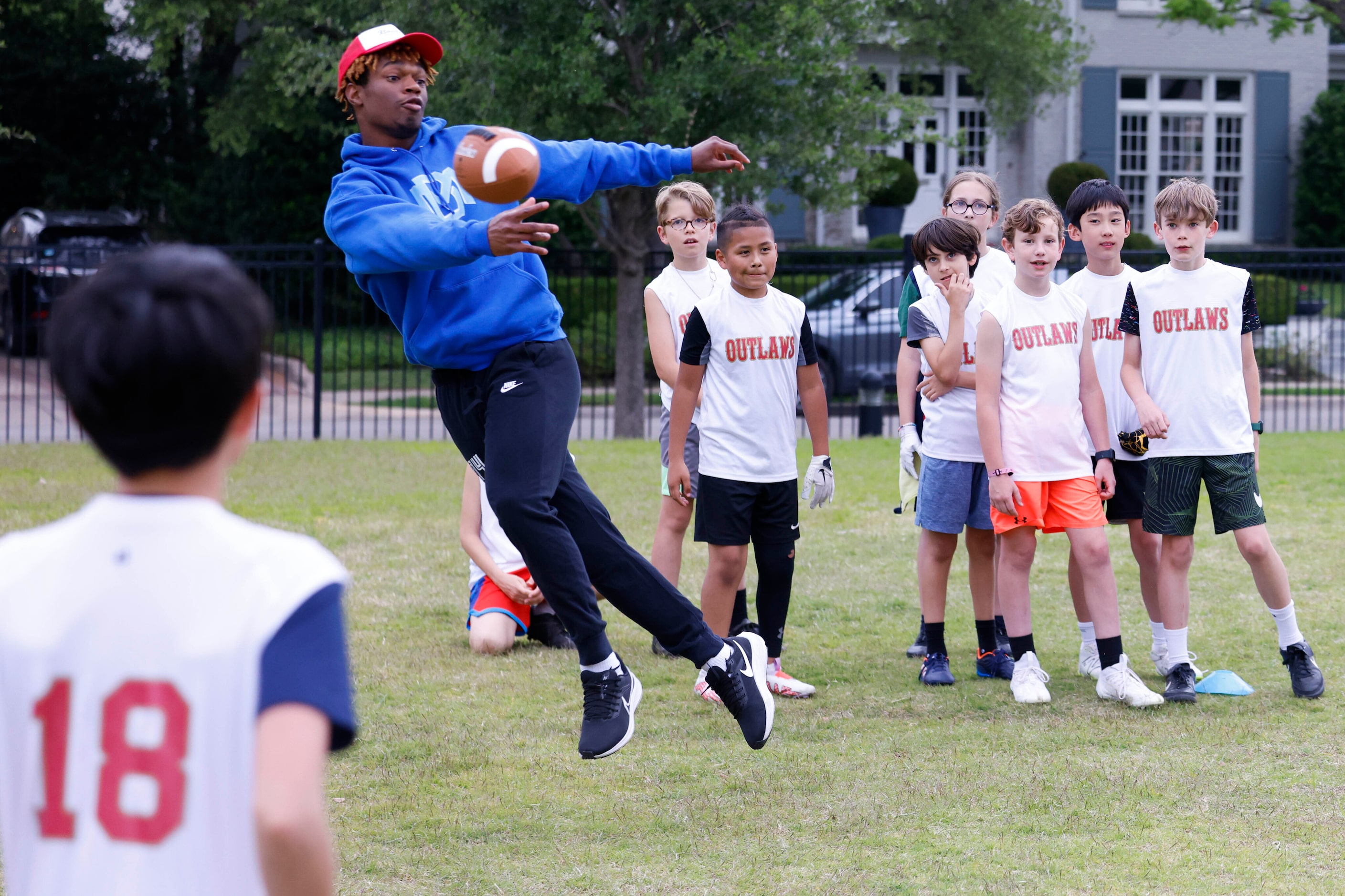 SMU’s Bryan Massey throws the ball during a special session of football drills and practice...