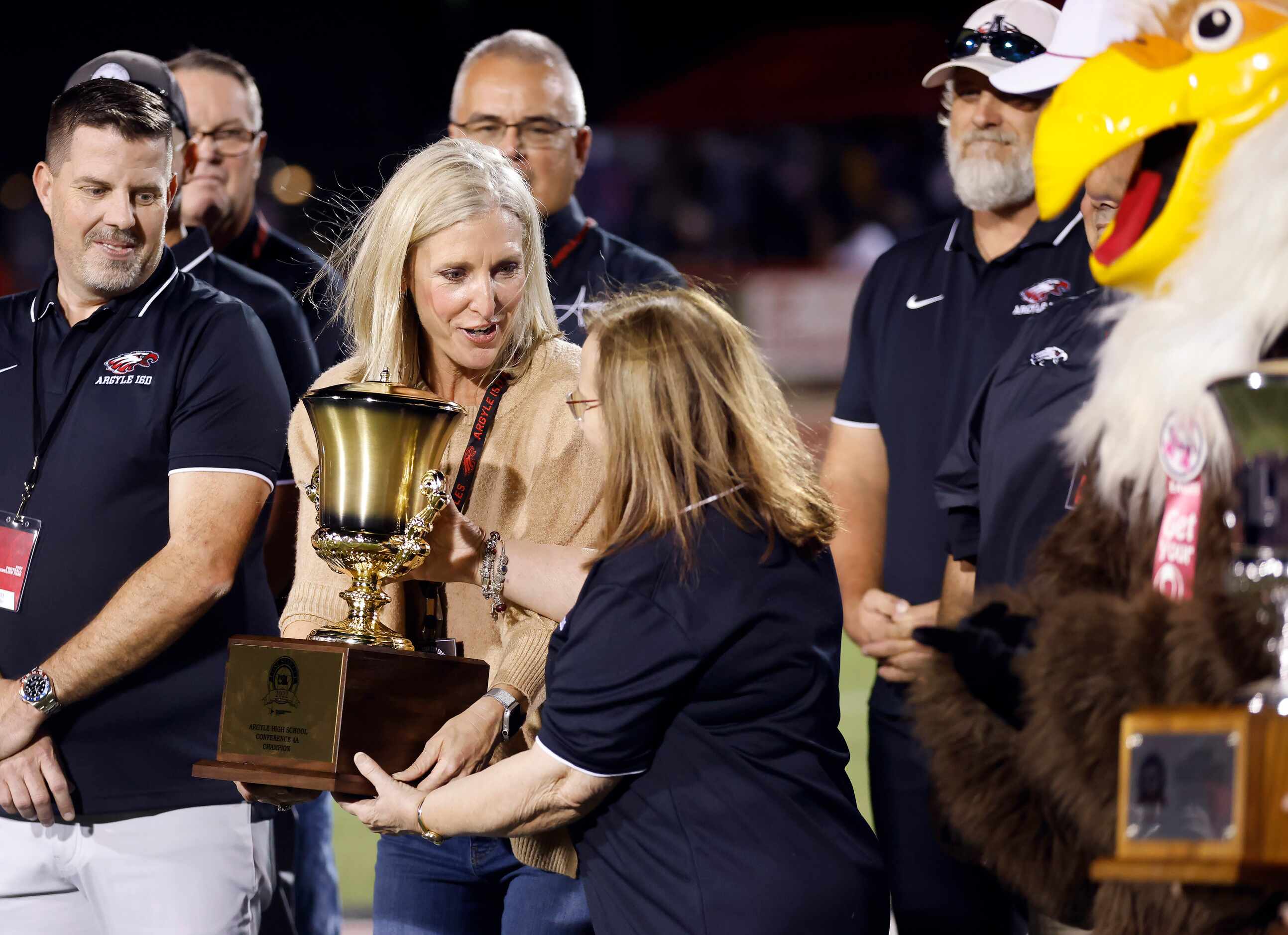  Argyle superintendent Dr. Telena Wright (center, right receives the 5A UIL Lone Star Cup...
