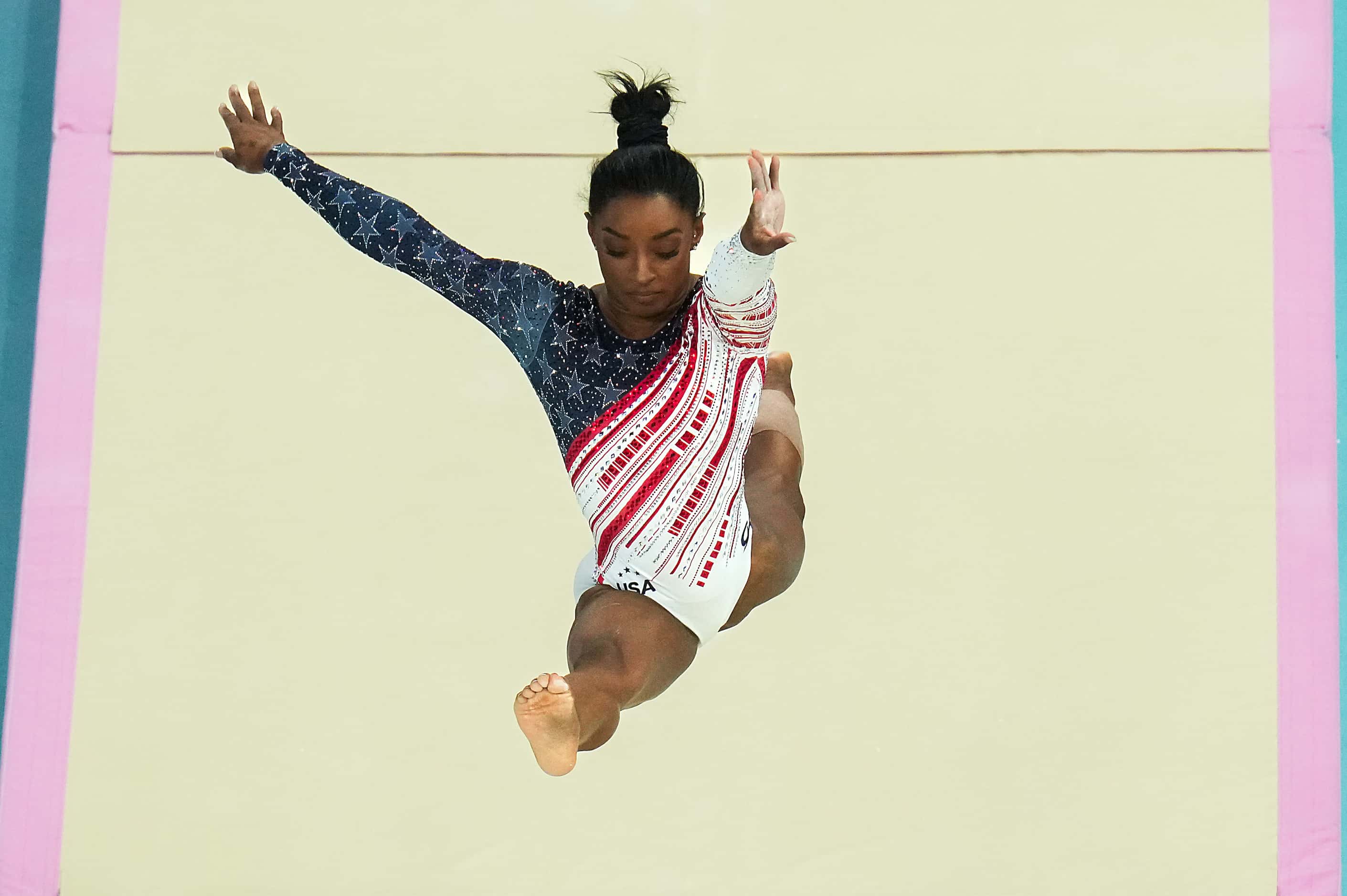 Simone Biles of the United States competes on the balance beam during the women’s gymnastics...