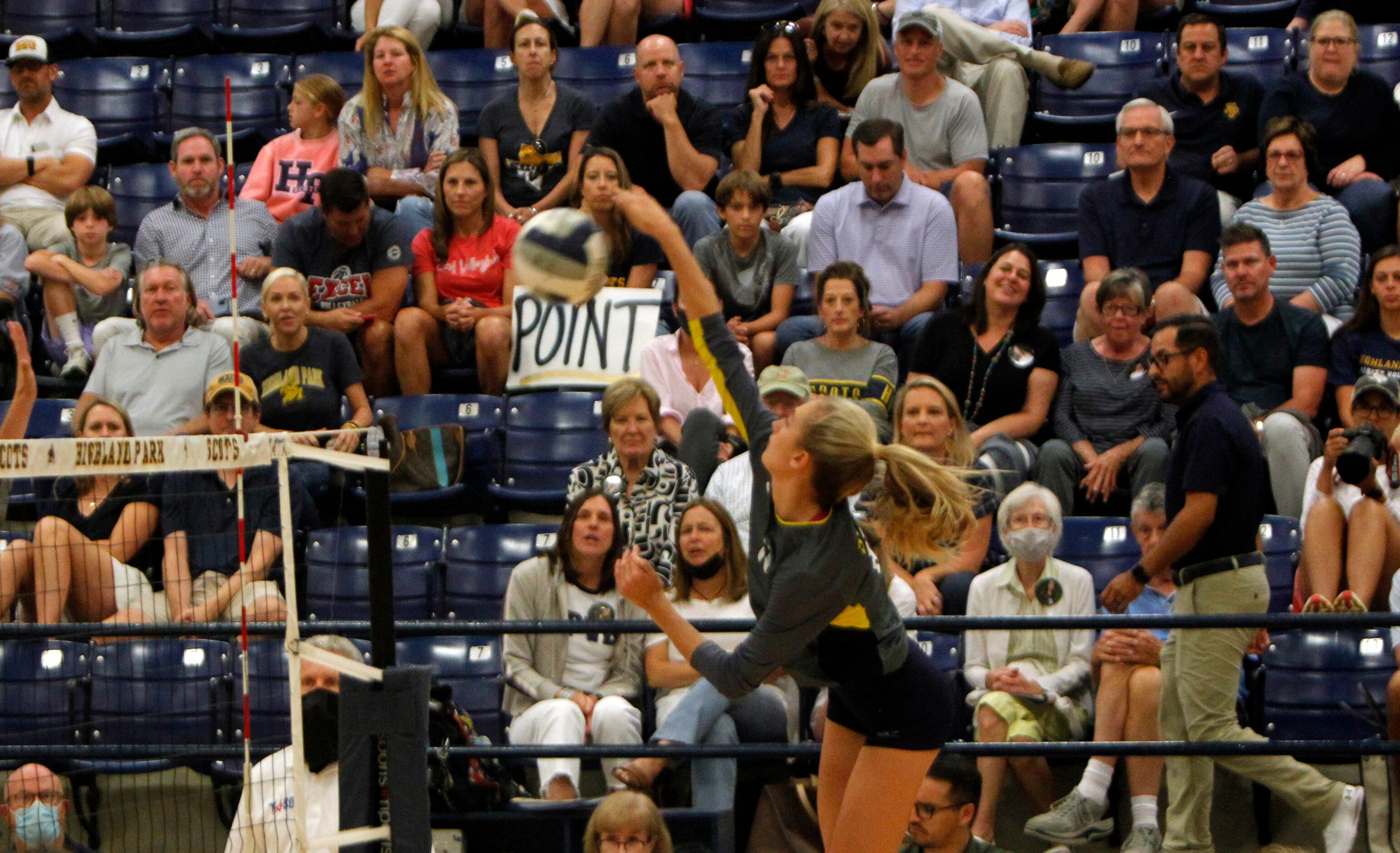 Highland Park's Presley Wright (10) leaps to score on a shot in front of the Scots fans...