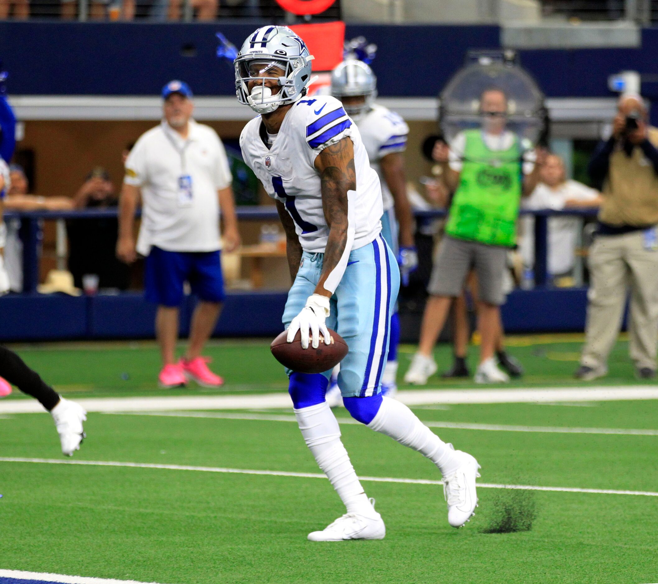 Dallas Cowboys wide receiver Cedrick Wilson (1) strolls into the end zone for a touchdown...