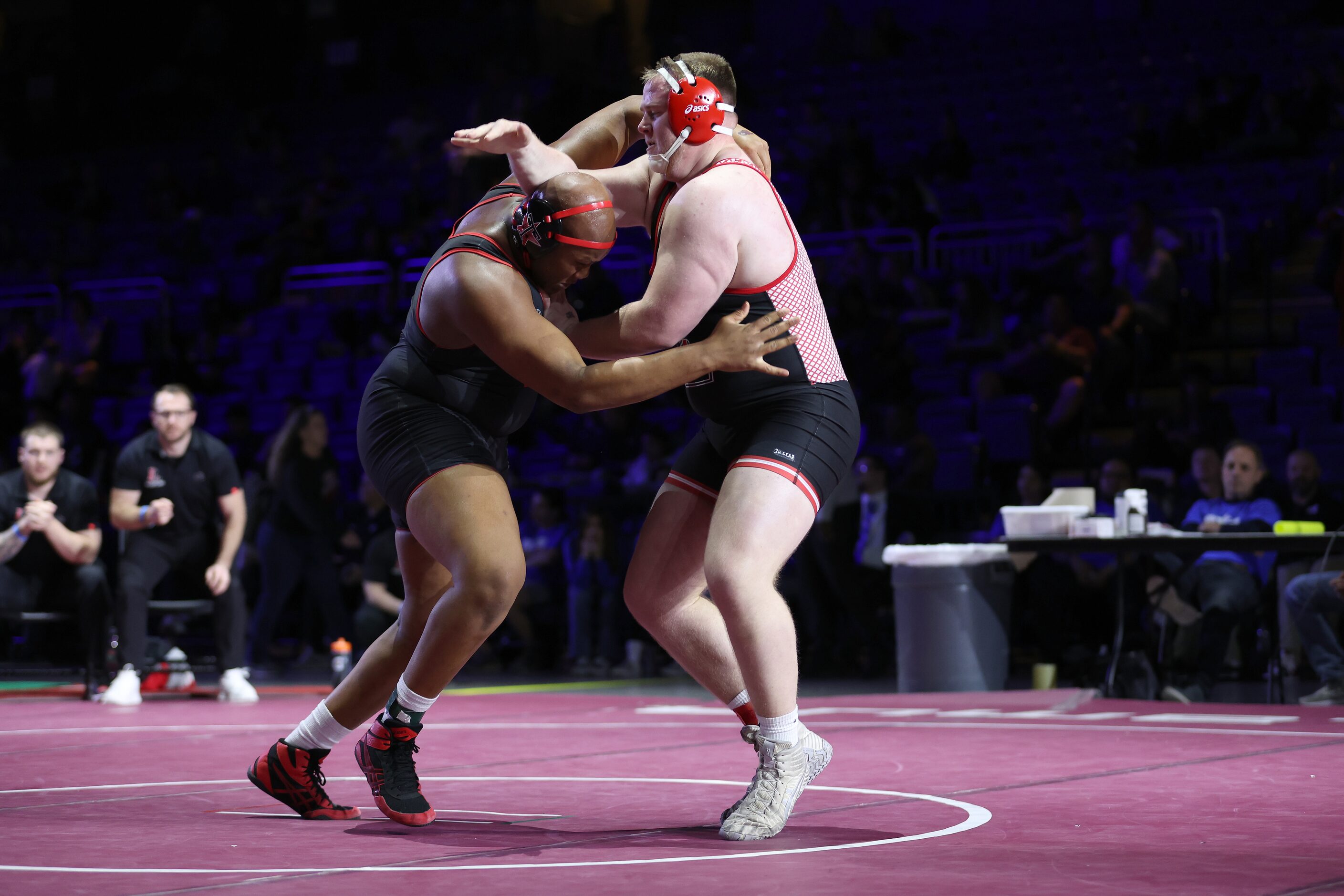 Sam Reynolds of Lovejoy (red) competes against Cameron Lewis of Rosenberg Terry in the Boys...