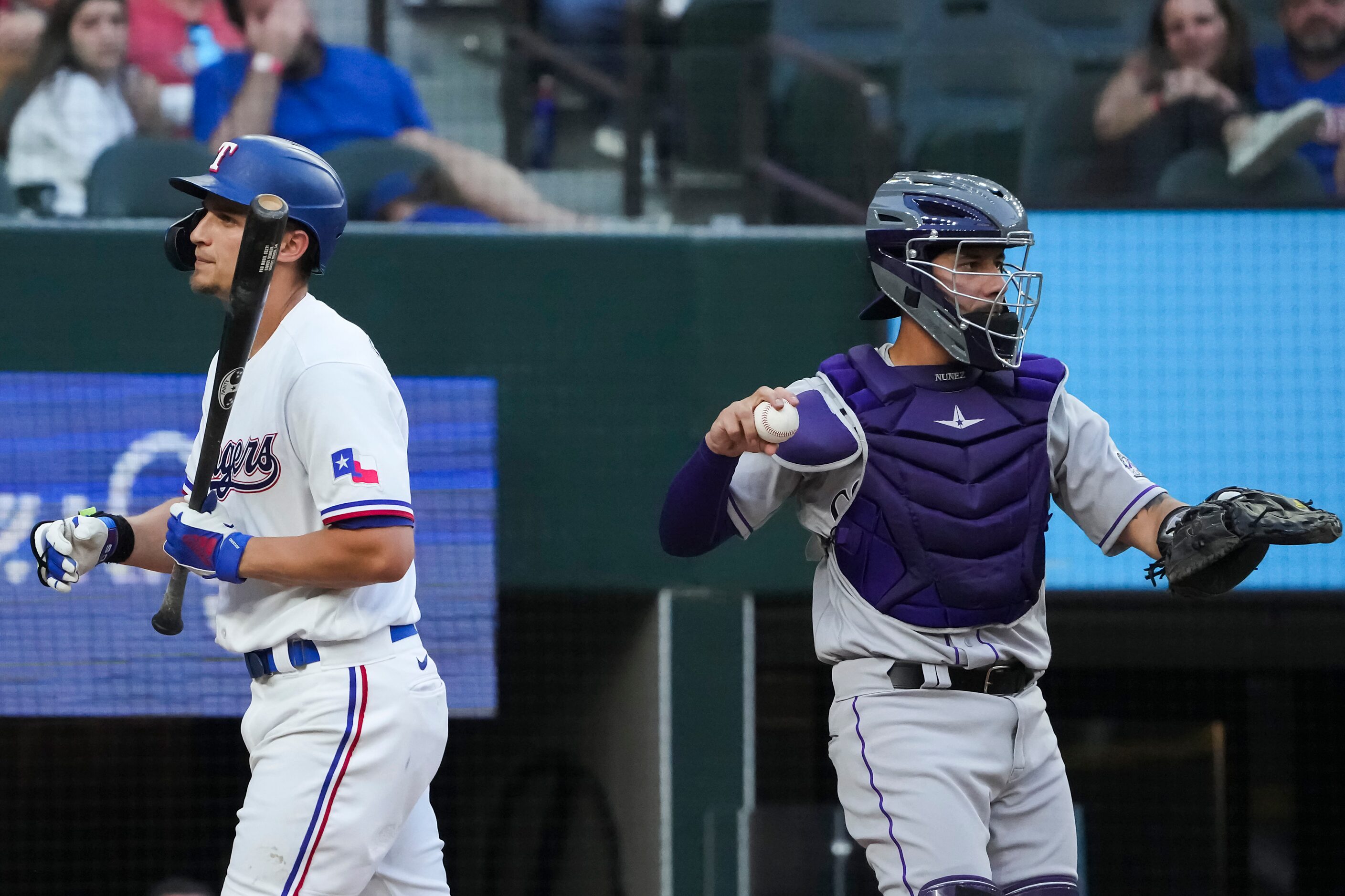 Texas Rangers shortstop Corey Seager heads back to the dugout after striking out during the...