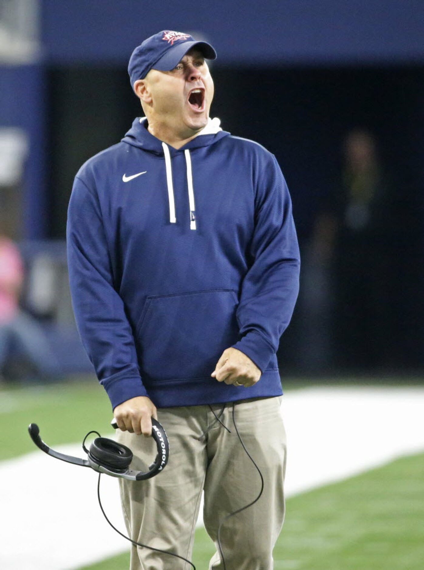 Denton Ryan head coach DaveHenigan takes exception with an official's call in the fourth...