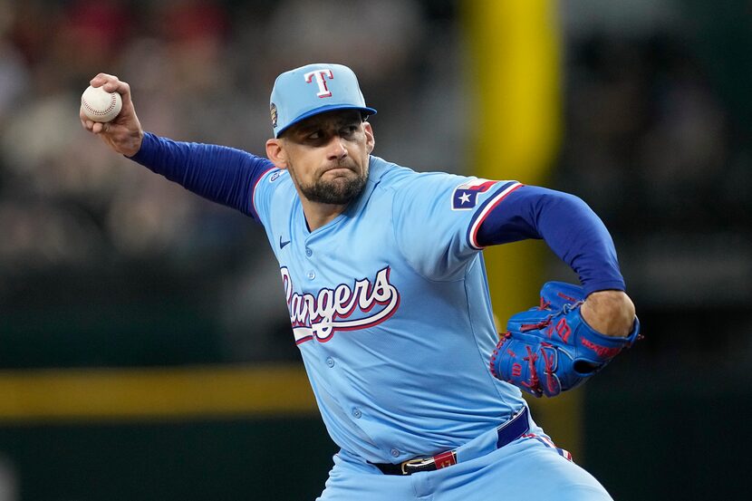 Texas Rangers starting pitcher Nathan Eovaldi throws to the San Francisco Giants in the...