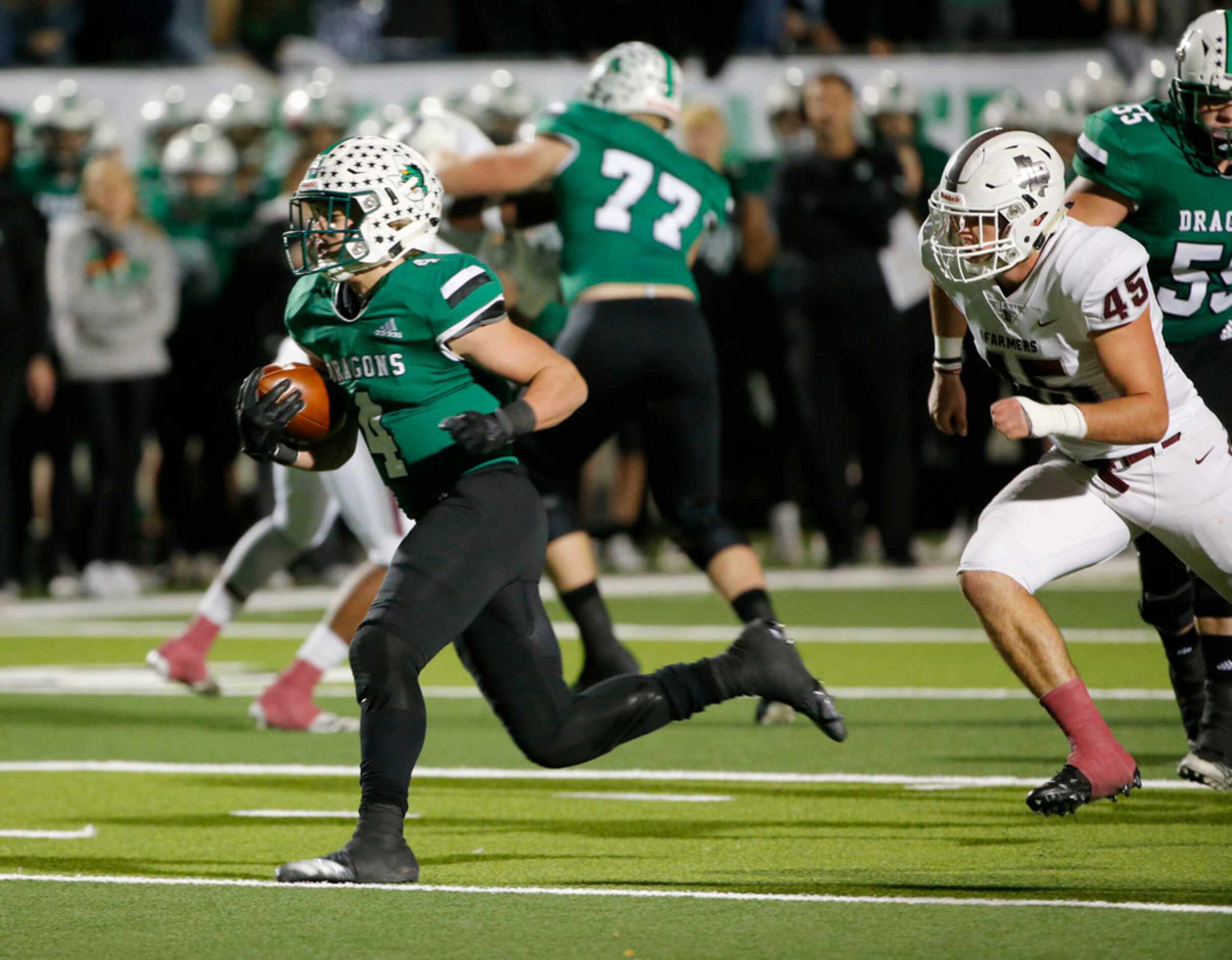 Southlake's Owen Allen (4) runs away from Lewisville's Luke Halter (45) to score a touchdown...