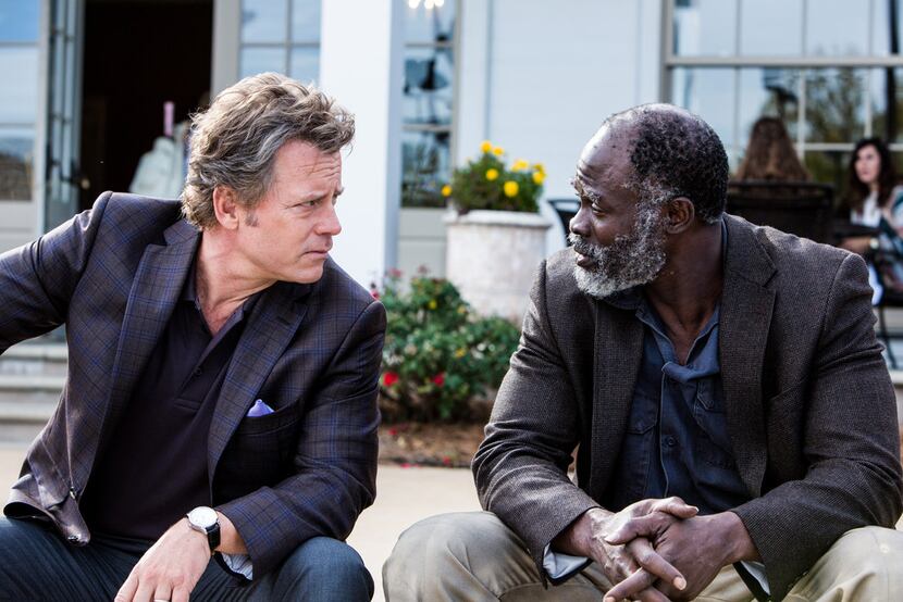 Greg Kinnear and Djimon Hounsou in Same Kind of Different As Me.