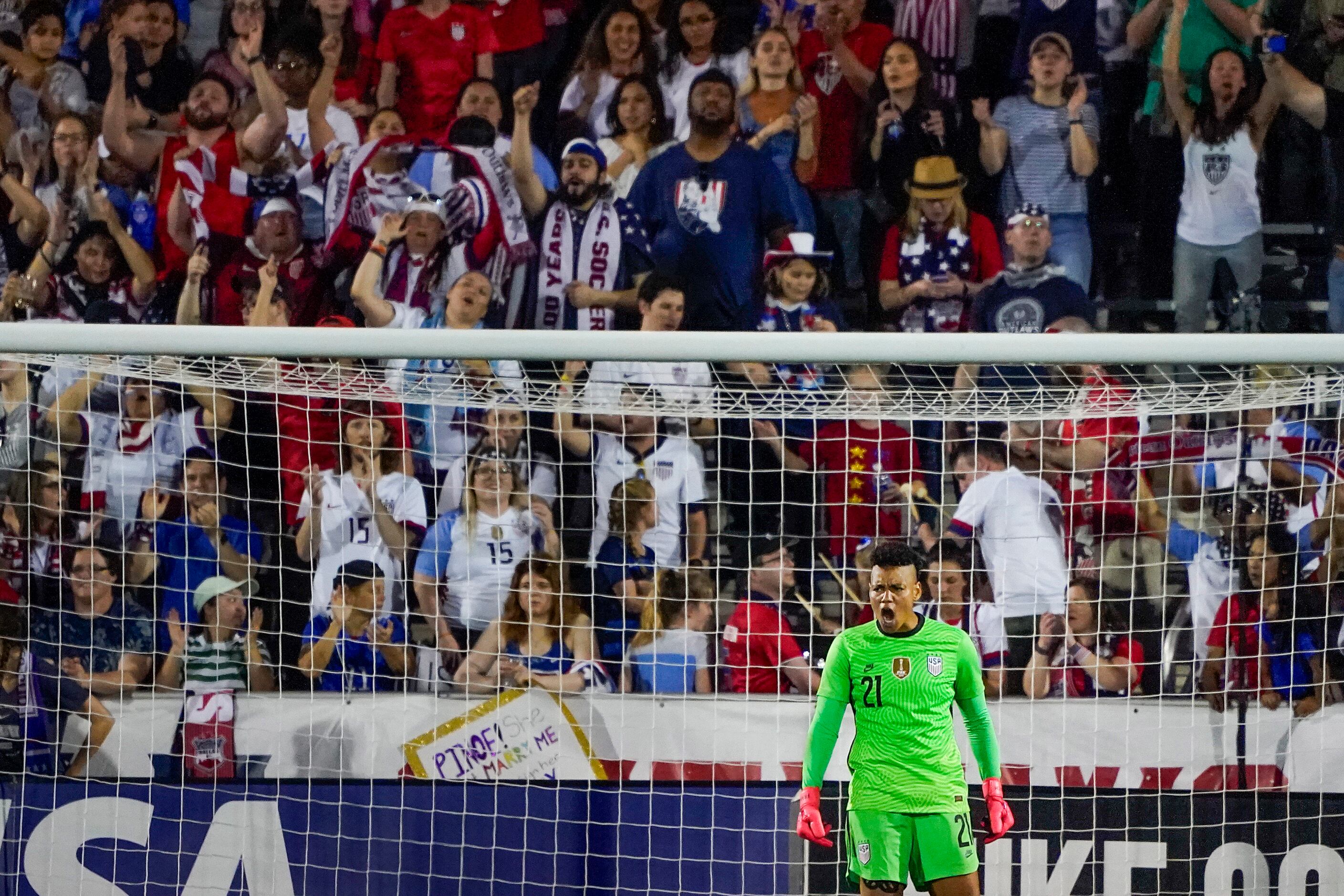 USA goalkeeper Adrianna Franch shouts to her teammates during the second half of a...