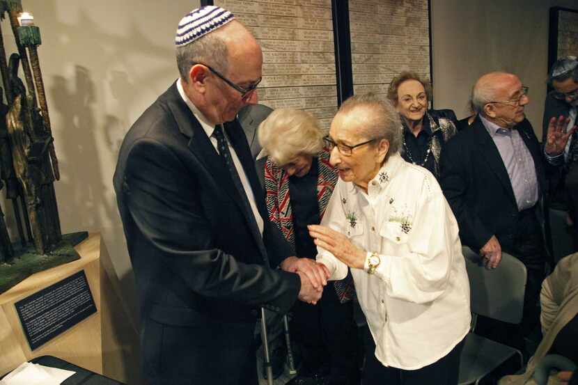 Rabbi Steven Fisch (left) talks with Holocaust survivor Irma Freudenreich, 97, in January 2015.