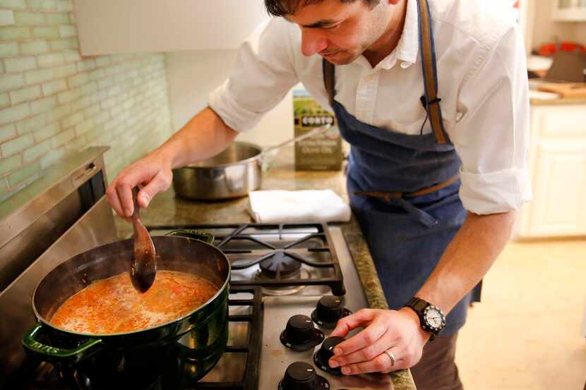Chef Julian Barsotti stirs Bolognese sauce for the elaborate, multi-layered Italian dish...