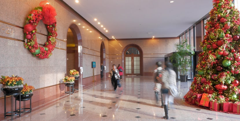 At Thanksgiving Tower, the remodeled lobbies will be decked out with white stonework, tile...