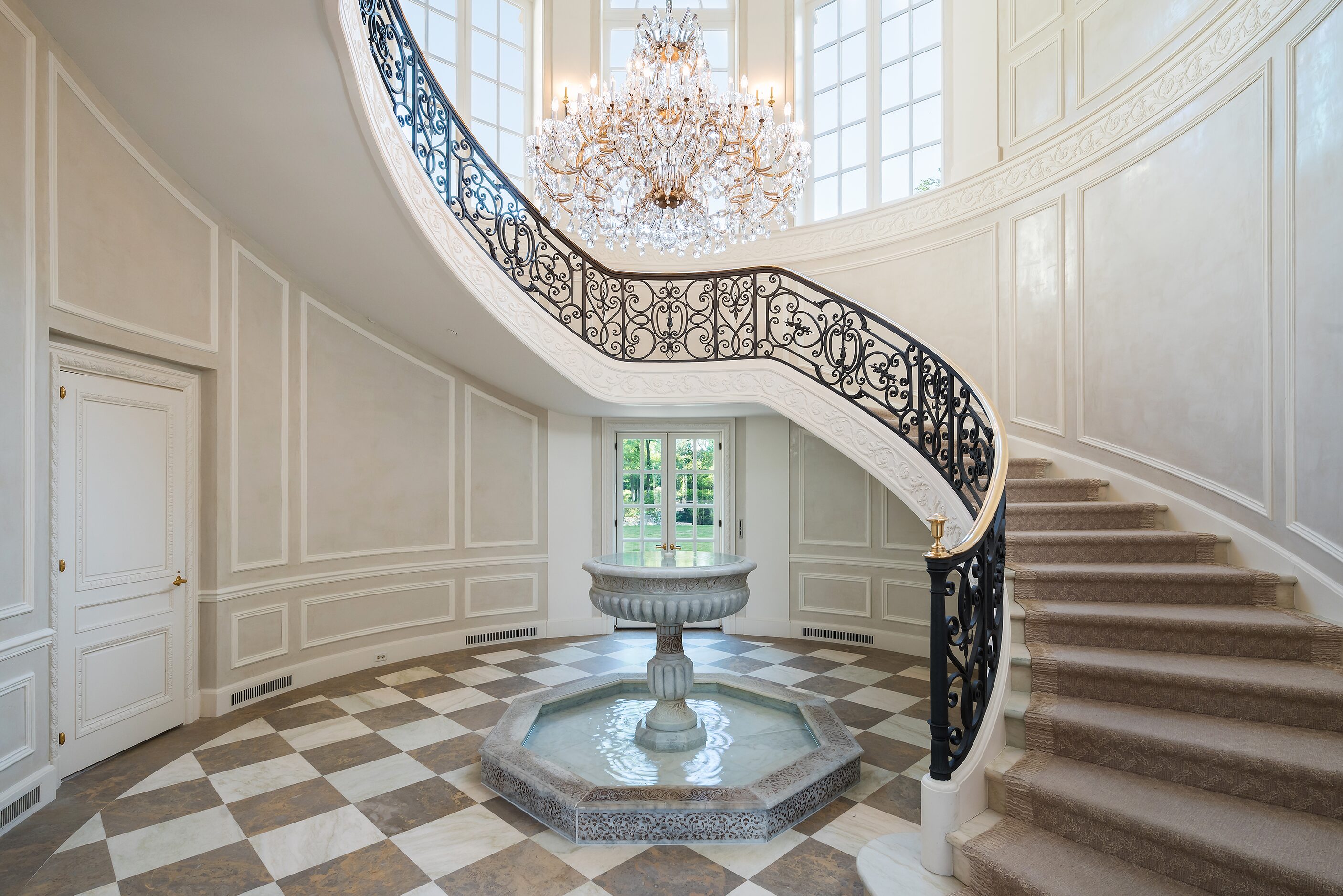 The grand staircase in the Crespi Estate.