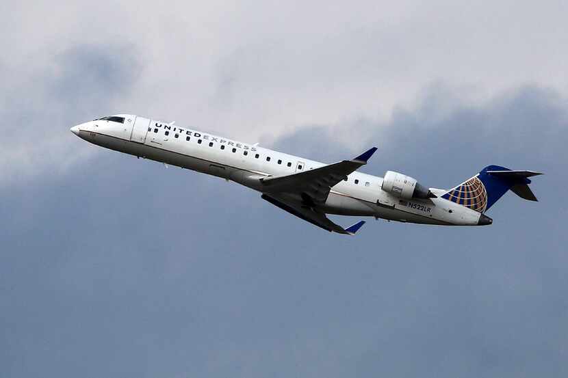 A United Airlines Express jet takes off from Pittsburgh International Airport, Wednesday,...
