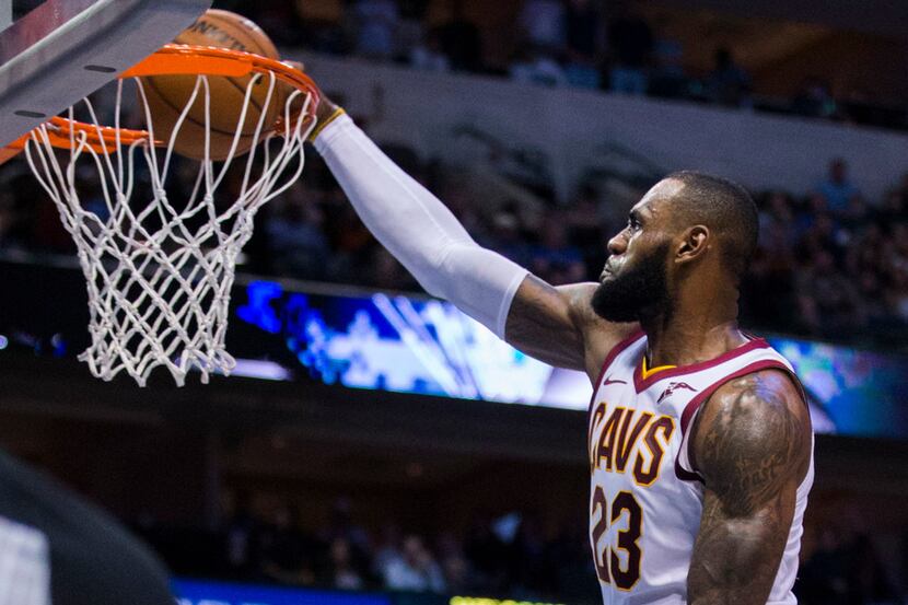 Cleveland Cavaliers forward LeBron James (23) dunks the ball during the fourth quarter...