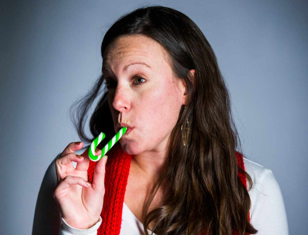 Guide Live's Tiney Ricciardi tries a pickle flavored candy cane in the studio on Friday,...
