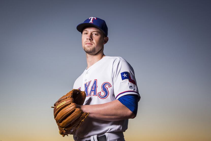 Texas Rangers pitcher Andrew Faulkner photographed during spring training photo day at the...