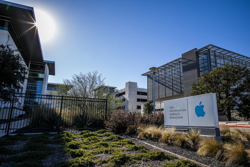 A sign for an Apple campus on West Palmer Lane in Austin is seen in 2018. 